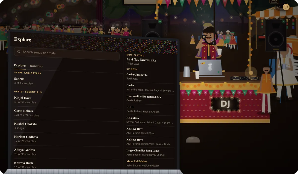 The DJ booth with laptop and bandhani draped table